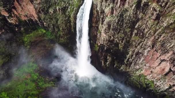 Drone Flys Backwards While Camera Looks Show Huge Waterfall Located — Vídeo de stock