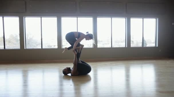 Partner Yoga Performance Done Two Professional Instructors — Vídeo de Stock