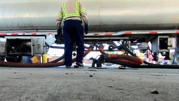 High Definition Low Angle Footage Driver Unloading Fuel Using Hoses — Vídeos de Stock