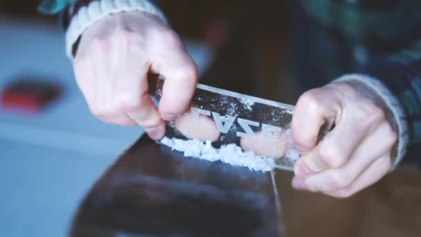 Slow Motion Shot Person Scraping Wax Ski Ironing — Stockvideo
