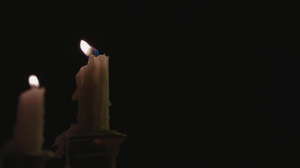 Close Two White Candles Lit Candelabra Slow Motion — Vídeo de stock