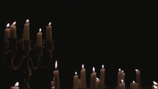 Group White Candles Some Candelabra Lit Running While Great Background — Stok Video