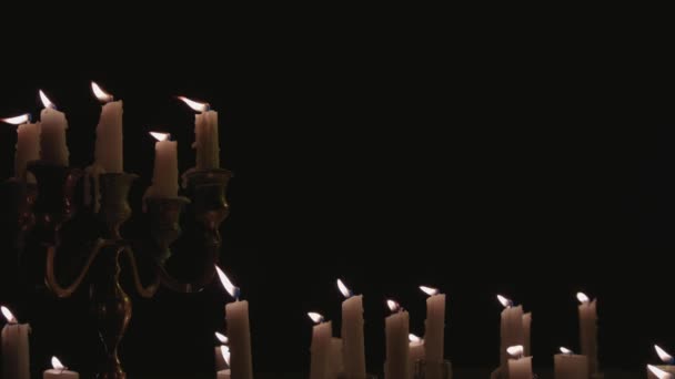 Group White Candles Some Candelabra Lit Running While Great Background — Stock Video
