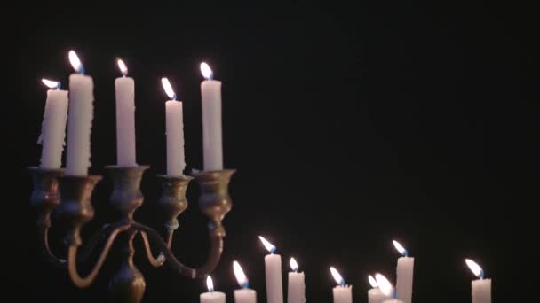 Group White Candles Some Candelabra Lit Blown Out Wind — Stockvideo