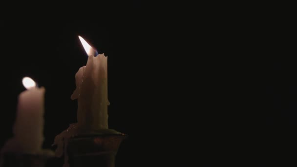 Close Two White Candles Lit Candelabra Being Blown Out Wind — Stockvideo