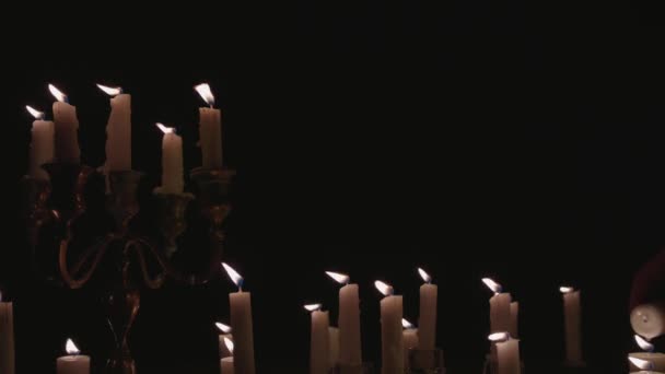 Group White Candles Some Candelabra Lit Running While Great Background — Wideo stockowe