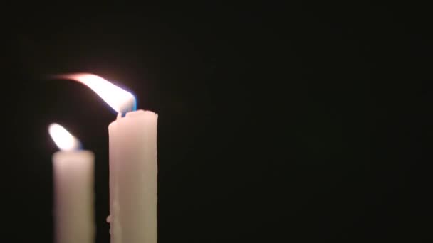 Two White Candles Lit Running Some Wind — Video Stock