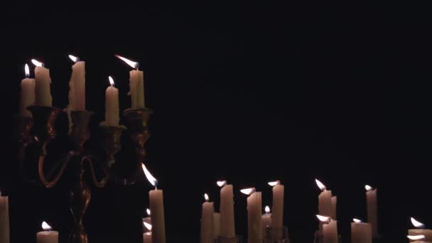Group White Candles Some Candelabra Lit Blown Out Strong Wind — Stockvideo