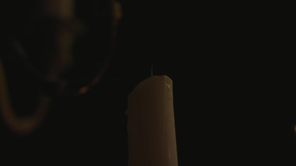 Lone White Candle Being Lite Another Candle Slow Motion — Video