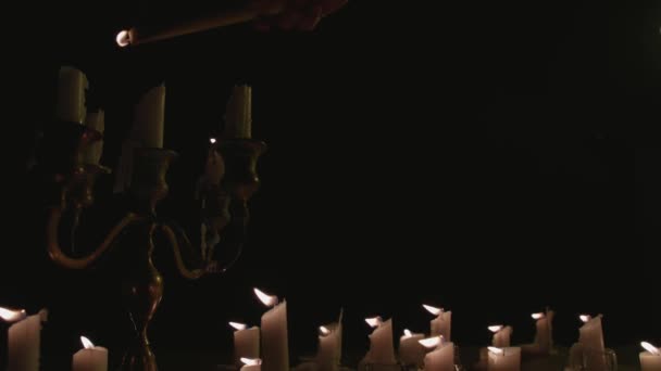 Candle Lighting Group White Candles Some Candelabra Getting Lit Running — Stockvideo
