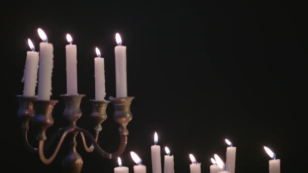 Group White Candles Some Candelabra Lit Blown Out Wind Slow — Stockvideo