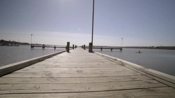 Footage Kayaker Fishing End Long Pier Pier Leads Viewer Horizon — Stock videók