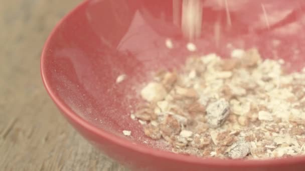 Muesli Pouring Breakfast Bowl — Vídeo de Stock