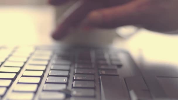 Hands Typing Laptop Grabs Drink — Stock Video