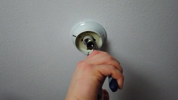 Removing Broken Part Light Bulb Pair Pliers Looking Broken Bulb — Vídeo de stock