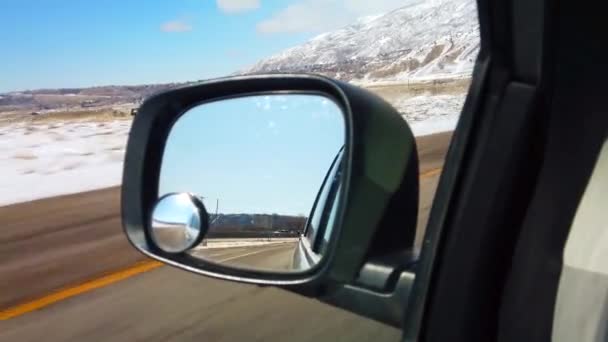 Rear View Mirror Driving Highway Snow Covered Mountains Background — Vídeo de stock