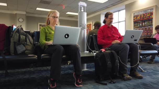 Mature Couple Working Laptop Computers Airport Lounge Next Charging Station — Video