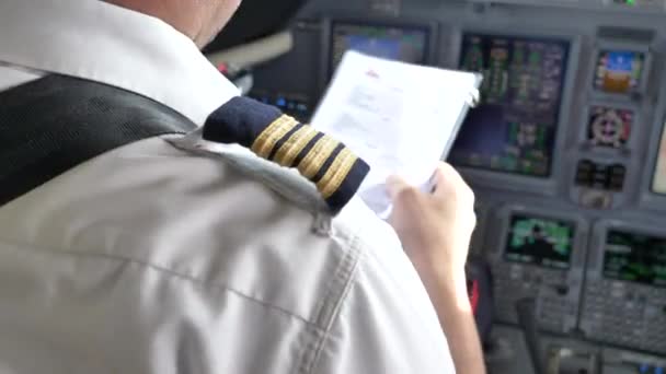 Airline Pilots Uniform Close Cockpit Flight Checklist — Stockvideo