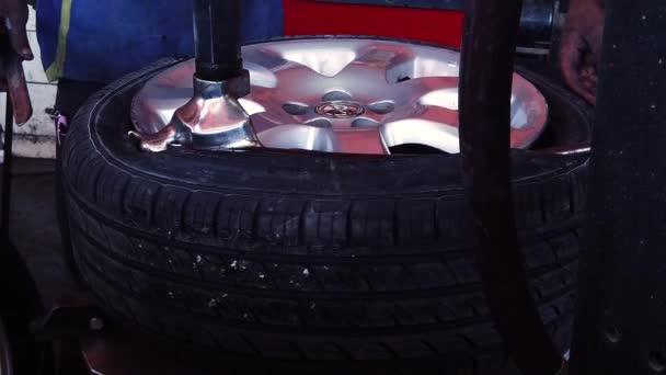 Tire Center Having Tire Fixed Put Back Together — Stockvideo