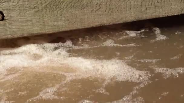 Dirty Brown Water Flowing — Video