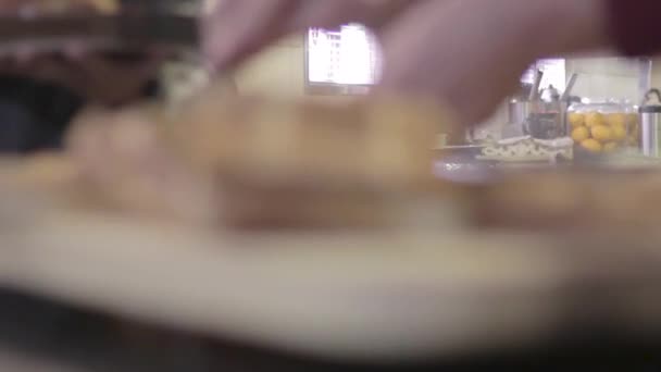 Elderley Woman Cutting Grilled Sandwiches Lunch — Stok Video