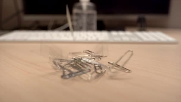 Hand Full Paper Clips Slowly Dropping Office Desk Super Slow — Wideo stockowe