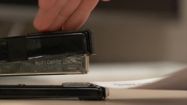 Side View Black Stapler Stapling Some Paper Together Really Slow — Vídeo de Stock