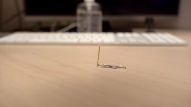 Hand Full Paper Clips Slowly Dropping Office Desk Super Slow — ストック動画