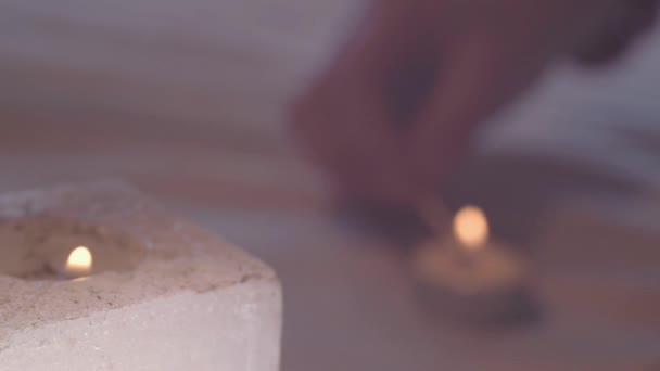 Lighting Candles Match Bokeh Background — Αρχείο Βίντεο