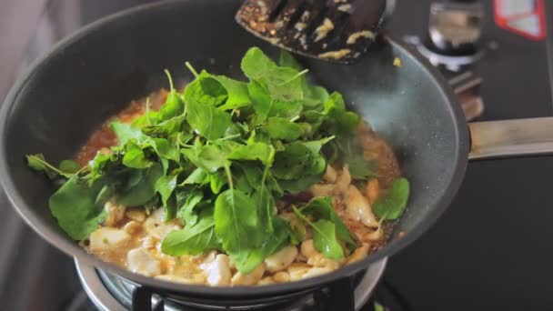 Woman Frying Small Pieces Chicken Chili Sauce Adding Green Basil — Video Stock