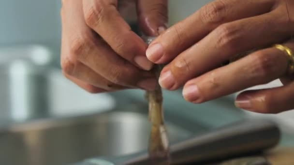 Skinless Raw Shrimp Being Broken Half Woman Making Deep Cut — Stock video