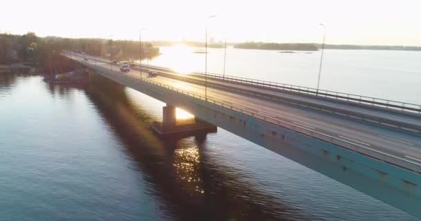 Tracking Aerial Shot Bridge Helsinki Sunset Cars Cyclists Visible Bridge — 비디오