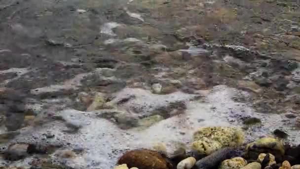 Water Rushes Stones Shore Foaming Way — Stockvideo