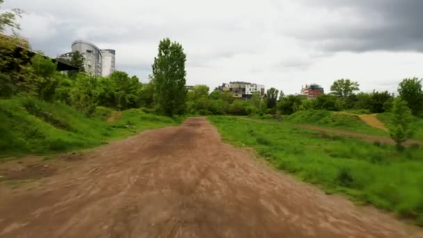 Aerial Shot Gravel Dirt Road City Green Surroundings — Vídeo de Stock