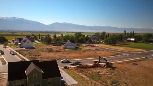 Drone Shot Construction Worker Digging Hole Morning Starting New House — Vídeo de Stock