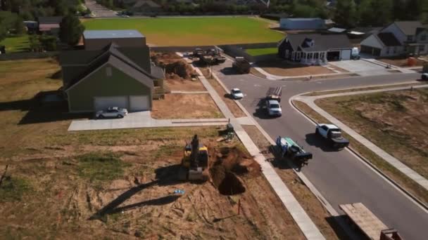 Drone Shot Construction Worker Digging Hole Morning Starting New House — Stockvideo