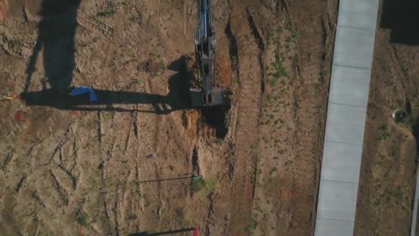 Drone Pull Away Creating Birds Eye View Backhoe Excavator Beginning — Stock Video