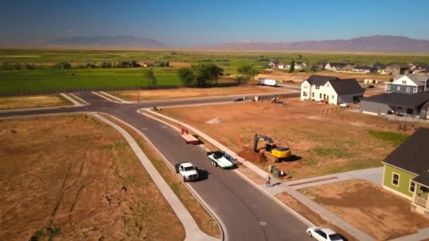 Drone Shot Construction Worker Digging Hole Morning Starting New House — Wideo stockowe