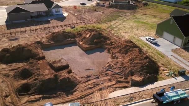 Drone Shot Spinning Recently Dug Hole Starting New House Built — Stockvideo