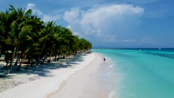 Aerial Girl Walking Beautiful White Beach Lined Palm Trees White — Αρχείο Βίντεο