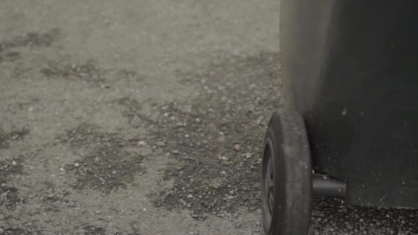 Close Person Pushing Garbage Bin Wheels — 图库视频影像