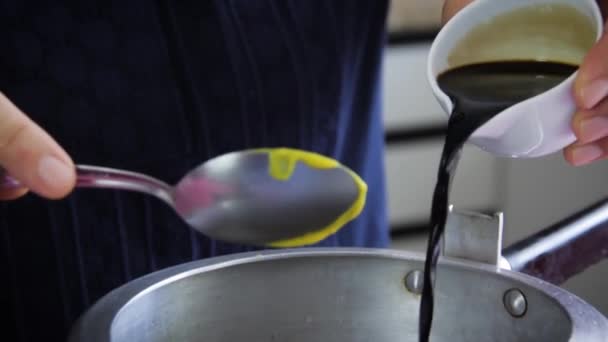 Female Hands Pouring Soy Sauce Pressure Pan Spoon Hands — Stock Video