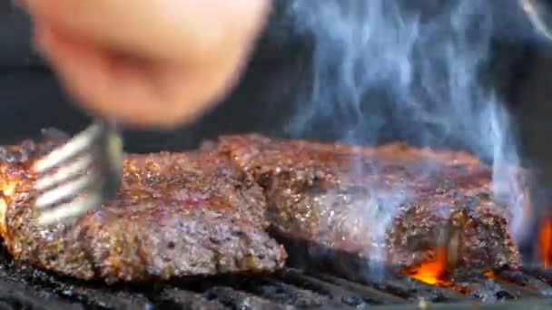Fork Turns Nearly Cooked Juicy Rib Eye Steak Grill — Vídeo de Stock
