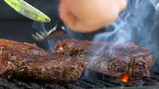 Fork Pushes Juicy Thick Cut Rib Eye Steak Flames Engulf — Vídeo de stock