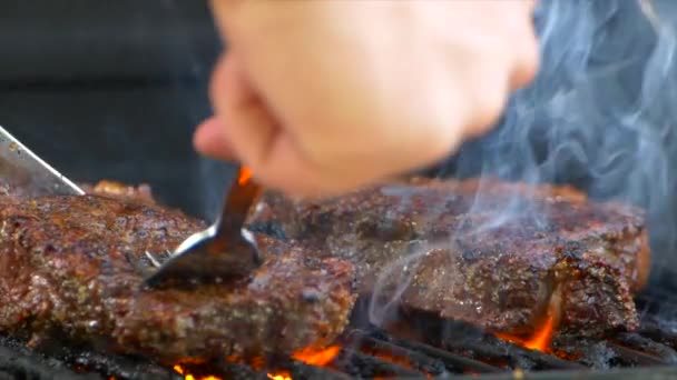 Fork Pushes Cooked Thick Cut Rib Eye Steak Flames Engulf — Vídeo de Stock
