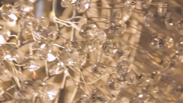 Close Glass Crystal Beads Dropping Chandelier Indoors Macro Bokeh Effect — Vídeos de Stock