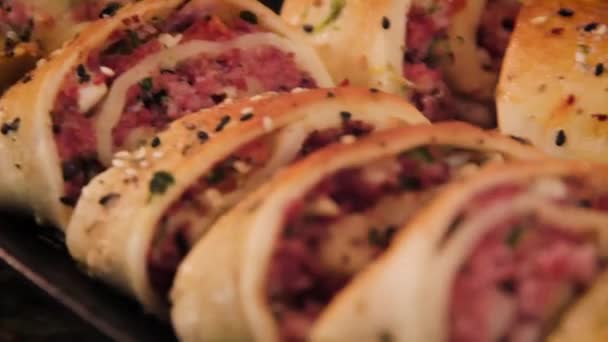 Homemade Italian Stromboli Sliced Served Black Plate Slider Motion Macro — Wideo stockowe