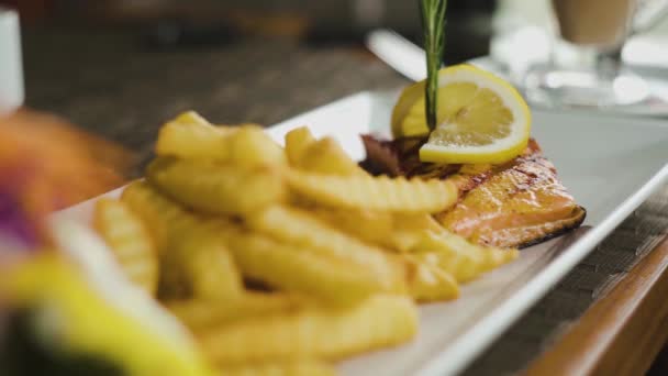 Salmon Steak French Fries Side Close Static Shot Slow Zoom — Videoclip de stoc