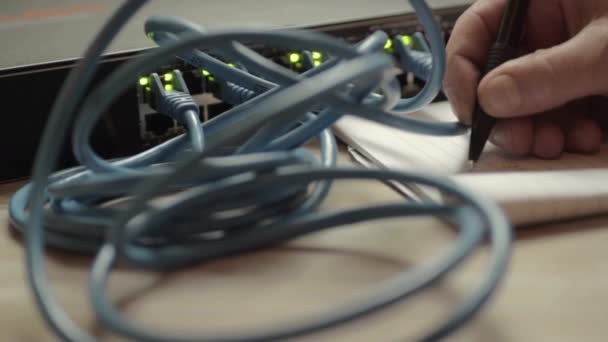 Network Engineer Working Ethernet Cable Switch — стокове відео