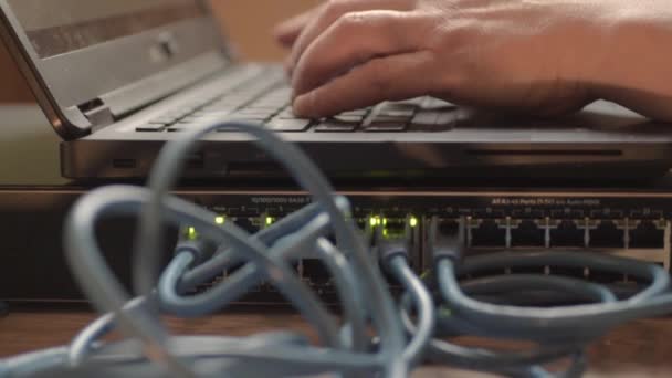 Network Engineer Working Ethernet Cable Switch — Vídeo de Stock